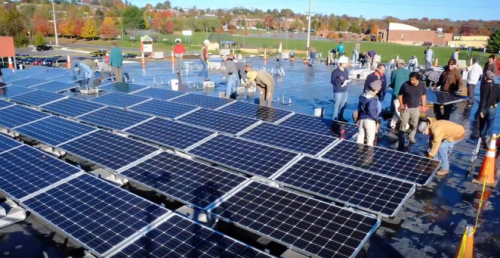 Are solar barnraisings and "voluntary gas taxes" the future of renewables incentives?